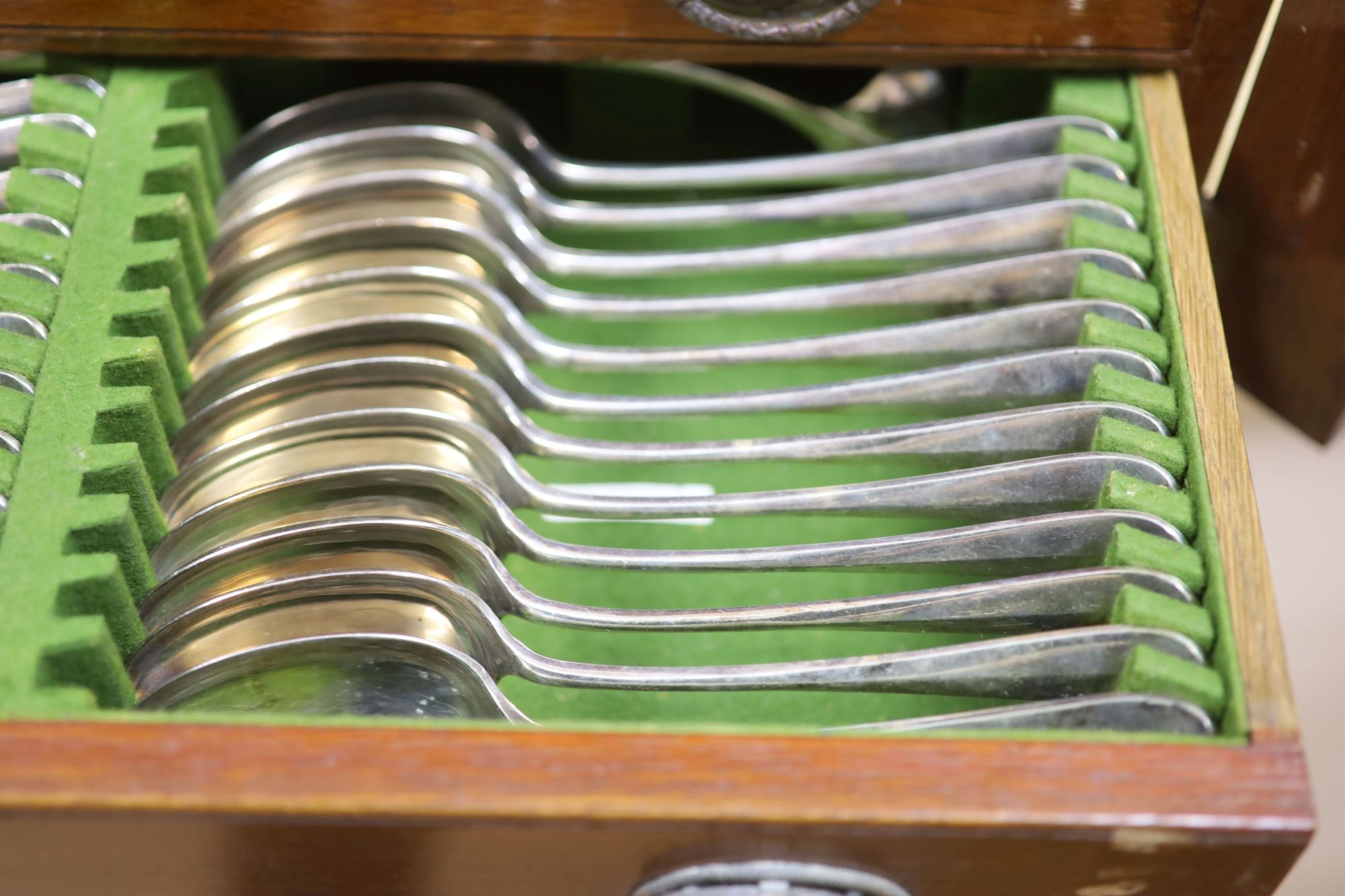 A mahogany cased canteen of silver-plated cutlery